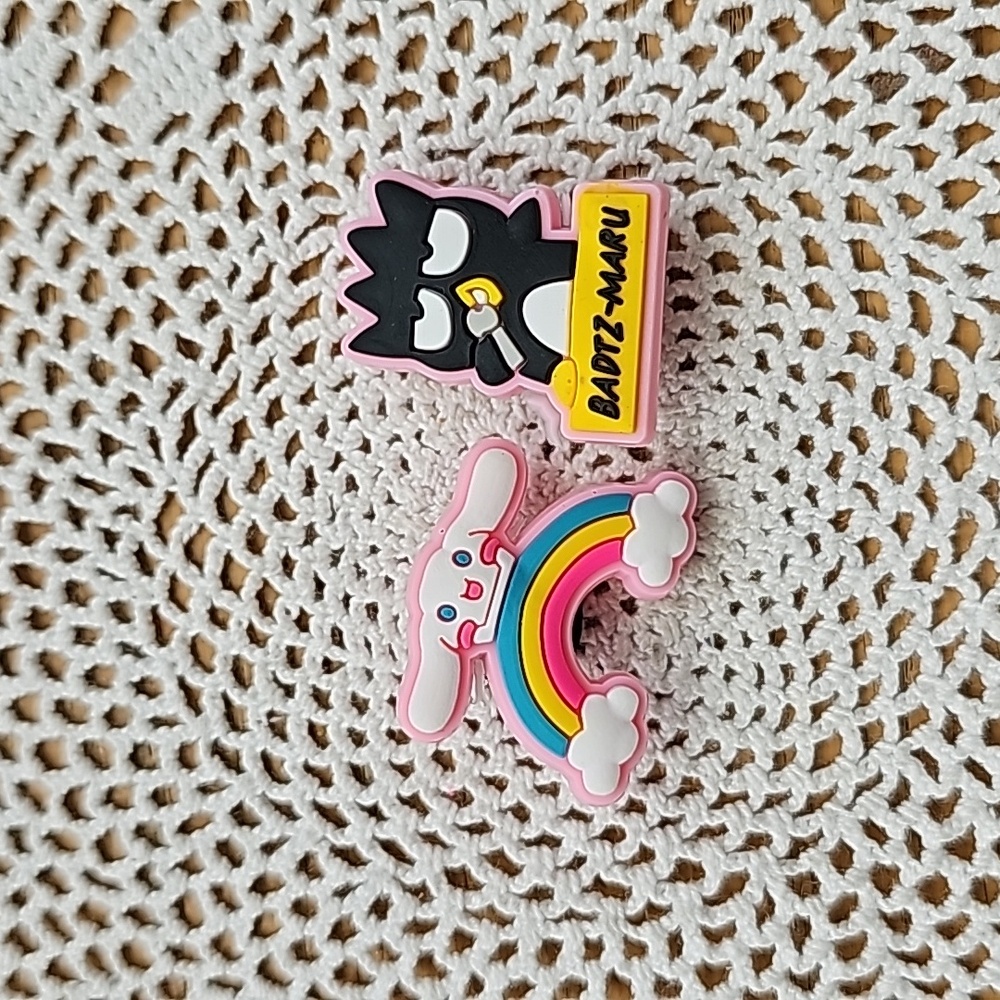 Sanrio Characters crock charms set of 2. New